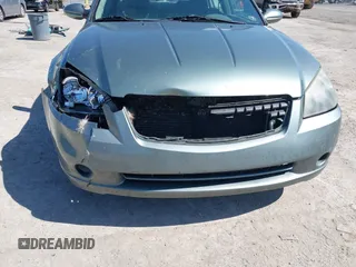 2006 Nissan Altima 2.5 S with VIN 1N4AL11D16C152112, listed as a IAAI auction lot 42048500 with 166,384 mi miles. Bid and sale history available at carsss.com. Image 6.