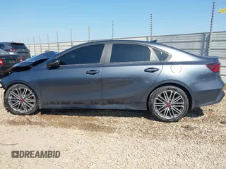 2022 Kia Forte GT with VIN 3KPF44AC7NE473424, listed as a IAAI auction lot 42003311 with 58,888 mi miles. Bid and sale history available at carsss.com. Image 14.