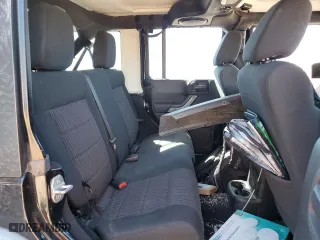 2012 Jeep Wrangler Unlimited Sport with VIN 1C4BJWDGXCL161569, listed as a Copart auction lot 50456355 with 133,703 mi miles and Salvage Title. Bid and sale history available at carsss.com. Image 12.