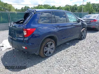2021 Honda Passport EX-L with VIN 5FNYF8H51MB020250, listed as a IAAI auction lot 40009629 with 54,239 mi miles and . Bid and sale history available at DreamBid. Image 4.