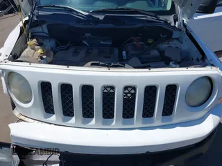 2014 Jeep Patriot Sport with VIN 1C4NJPBB1ED730204, listed as a IAAI auction lot 42498489 with 118,037 mi miles and . Bid and sale history available at DreamBid. Image 10.