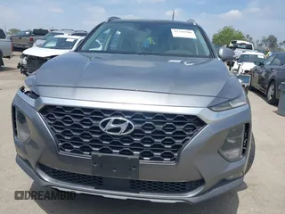 2019 Hyundai Santa Fe Limited z VIN 5NMS53AD2KH088517, wystawiony jako IAAI lot #42226900 z przebiegiem 73 672 mil mil oraz . Historia ofert i sprzedaży dostępna na DreamBid. Obrazek 13.