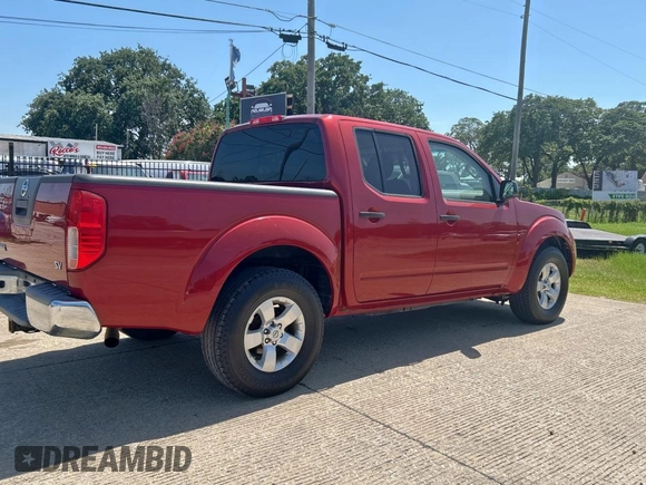 2012 Nissan Frontier SV with VIN 1N6AD0ER8CC456988, listed as a Copart auction lot 66021335 with 151,605 mi miles and Clean title. Bid and sale history available at DreamBid. Image 4.