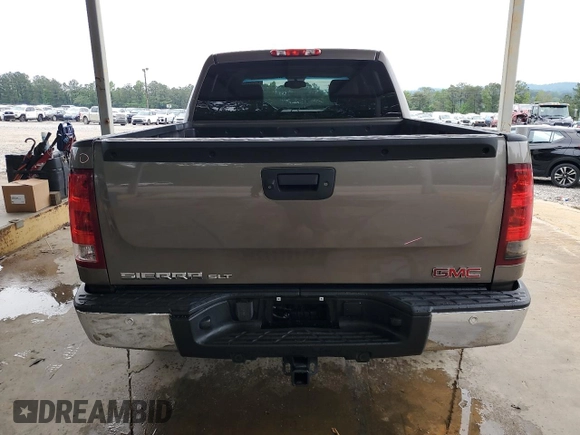 2012 GMC Sierra 1500 SLT with VIN 3GTP2WE74CG310914, listed as a Copart auction lot 56049905 with 106,882 mi miles and Salvage title. Bid and sale history available at DreamBid. Image 6.