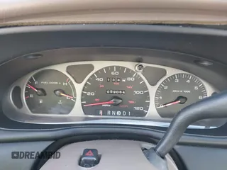 1999 Ford Taurus SE with VIN 1FAFP53U4XG223246, listed as a IAAI auction lot 41570969 with 59,064 mi miles. Bid and sale history available at carsss.com. Image 7.