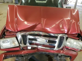 2009 Ford Ranger XL with VIN 1FTYR10D39PA15761, listed as a Copart auction lot 61823265 with 148,225 mi miles and Salvage title. Bid and sale history available at DreamBid. Image 11.
