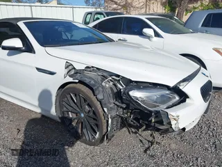 2018 BMW 6 Series 640i with VIN WBA6F1C5XJGT83781, listed as a IAAI auction lot 41945616 with 46,370 mi miles and . Bid and sale history available at carsss.com. Image 6.
