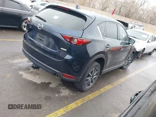 2018 Mazda CX-5 Grand Touring with VIN JM3KFBDM8J0345821, listed as a IAAI auction lot 41789284 with 1 mi miles. Bid and sale history available at carsss.com. Image 4.