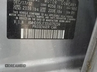 2013 Hyundai Elantra z VIN KMHD35LE3DU075234, wystawiony jako Copart lot #57754185 z przebiegiem 107 040 mil mil oraz Szkoda całkowita • Salvage title. Historia ofert i sprzedaży dostępna na DreamBid. Obrazek 13.