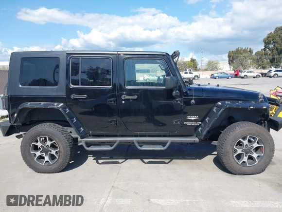 2008 Jeep Wrangler Unlimited Sahara with VIN 1J8GA59168L587554, listed as a IAAI auction lot 41963587 with 189,943 mi miles and . Bid and sale history available at DreamBid. Image 13.