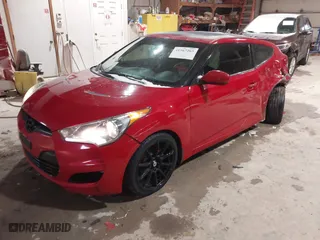 2012 Hyundai Veloster w/Black Int with VIN KMHTC6AD8CU032759, listed as a IAAI auction lot 41567265 with 156,973 mi miles. Bid and sale history available at carsss.com. Image 2.