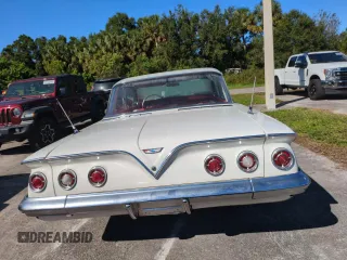 1961 Chevrolet Impala с VIN 11739B190181, выставлен на аукционе Copart как лот 75408464 с пробегом 85 386 миль миль и Списание • Salvage title. История ставок и продаж доступна на DreamBid. Изображение 6.