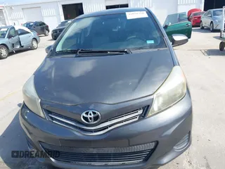 2012 Toyota Yaris L with VIN JTDKTUD38CD540219, listed as a IAAI auction lot 42091750 with 152,878 mi miles. Bid and sale history available at carsss.com. Image 12.