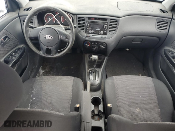 2010 Kia Rio with VIN KNADH4B33A6617736, listed as a Copart auction lot 45469215 with 233,539 mi miles and Clean Title. Bid and sale history available at DreamBid. Image 8.