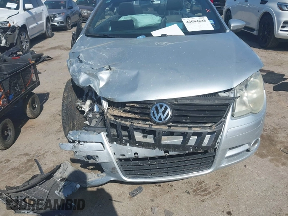 2009 Volkswagen Eos Komfort with VIN WVWBA71F39V020521, listed as a IAAI auction lot 42004648 with 50,885 mi miles and . Bid and sale history available at DreamBid. Image 12.