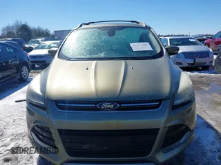 2013 Ford Escape Titanium with VIN 1FMCU9J99DUD46870, listed as a IAAI auction lot 41614409 with 141,739 mi miles and . Bid and sale history available at DreamBid. Image 12.