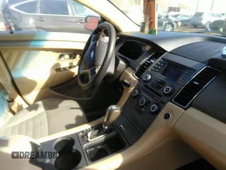 2014 Ford Taurus SE with VIN 1FAHP2D82EG167913, listed as a IAAI auction lot 41710659 with 155,738 mi miles. Bid and sale history available at carsss.com. Image 5.