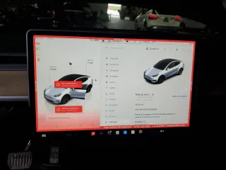 2024 Tesla Model Y Long Range with VIN 7SAYGDEE2RA299824, listed as a Copart auction lot 56040835 with 16,534 mi miles and Salvage title. Bid and sale history available at DreamBid. Image 9.