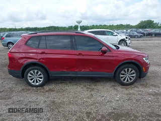 2018 Volkswagen Tiguan S with VIN 3VV1B7AX3JM045193, listed as a IAAI auction lot 42311886 with 69,049 mi miles and . Bid and sale history available at DreamBid. Image 13.
