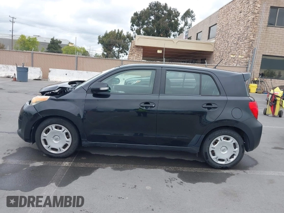 2009 Scion xD with VIN JTKKU10469J034191, listed as a IAAI auction lot 41982622 with 175,743 mi miles. Bid and sale history available at carsss.com. Image 14.