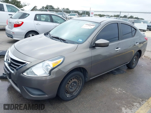 2015 Nissan Versa SV with VIN 3N1CN7APXFL936886, listed as a IAAI auction lot 41423608 with 126,598 mi miles. Bid and sale history available at carsss.com. Image 2.