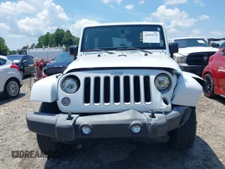 2018 Jeep Wrangler Unlimited Sahara with VIN 1C4BJWEG3JL805263, listed as a IAAI auction lot 42593276 with 96,489 mi miles and . Bid and sale history available at DreamBid. Image 12.