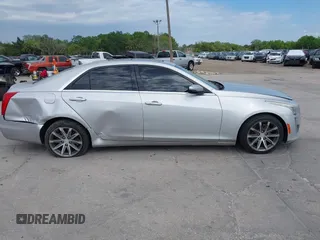 2016 Cadillac CTS with VIN 1G6AR5SS9G0194126, listed as a IAAI auction lot 41972437 with 129,742 mi miles and . Bid and sale history available at DreamBid. Image 13.