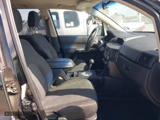 2011 Mitsubishi Endeavor LS with VIN 4A4JN2AS0BE026338, listed as a IAAI auction lot 41703458 with 140,986 mi miles. Bid and sale history available at carsss.com. Image 5.