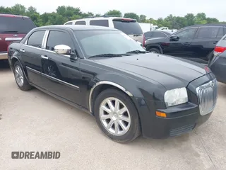 2007 Chrysler 300 z VIN 2C3LA43R57H875094, wystawiony jako IAAI lot #42377656 z przebiegiem 125 067 mil mil oraz . Historia ofert i sprzedaży dostępna na DreamBid. Obrazek 1.