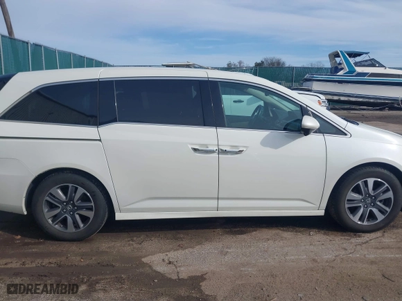 2015 Honda Odyssey Touring Elite with VIN 5FNRL5H9XFB121921, listed as a IAAI auction lot 41858551 with 61,506 mi miles. Bid and sale history available at carsss.com. Image 13.