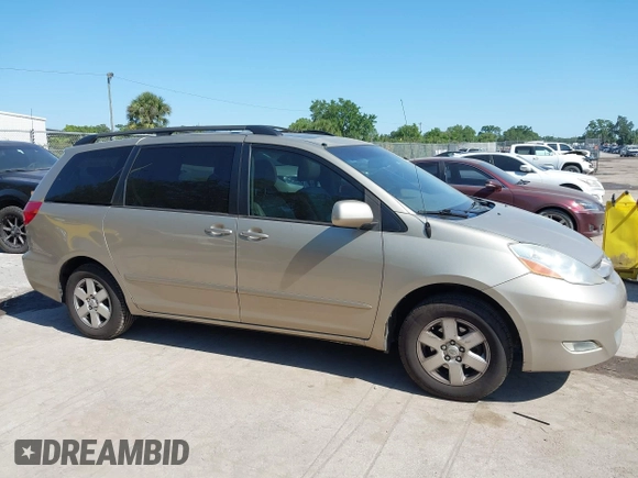 2010 Toyota Sienna XLE with VIN 5TDYK4CC5AS292110, listed as a IAAI auction lot 42055505 with 107,390 mi miles. Bid and sale history available at carsss.com. Image 13.