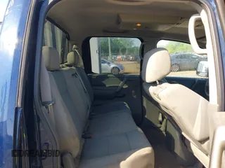2007 Nissan Titan SE z VIN 1N6BA07B77N214250, wystawiony jako IAAI lot #42142029 z przebiegiem 184 575 mil mil oraz . Historia ofert i sprzedaży dostępna na DreamBid. Obrazek 8.