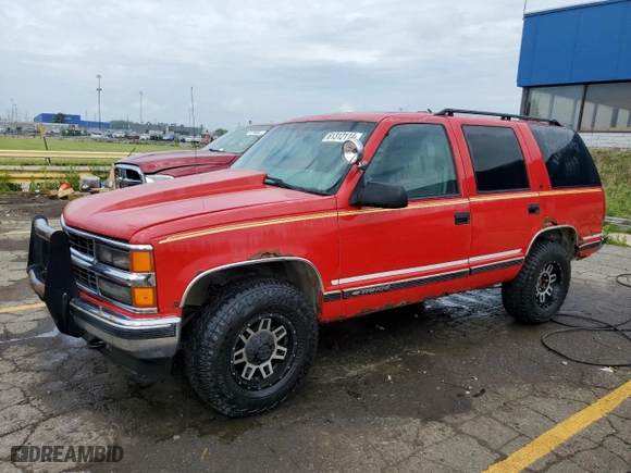 1999 Chevrolet Tahoe Z71 with VIN 1GNEK13R9XJ476615, listed as a Copart auction lot 61312114 with 174,729 mi miles and Clean Title. Bid and sale history available at carsss.com. Image 1.