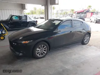2021 Mazda Mazda3 Hatchback 2.5 S with VIN JM1BPAJL5M1338061, listed as a IAAI auction lot 40765593 with 52,958 mi miles. Bid and sale history available at carsss.com. Image 18.