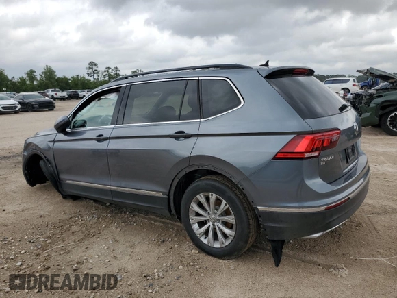 2018 Volkswagen Tiguan SEL z VIN 3VV2B7AX7JM004960, wystawiony jako Copart lot #55803665 z przebiegiem 102 492 mil mil oraz Szkoda całkowita • Salvage title. Historia ofert i sprzedaży dostępna na DreamBid. Obrazek 2.