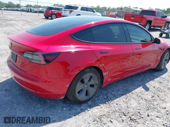 2022 Tesla Model 3 with VIN 5YJ3E1EA7NF152114, listed as a IAAI auction lot 42097399 with 96,726 mi miles. Bid and sale history available at carsss.com. Image 4.