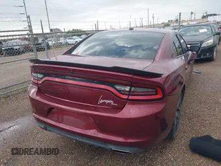 2020 Dodge Charger SXT with VIN 2C3CDXBG2LH136073, listed as a IAAI auction lot 41900921 with 55,747 mi miles and . Bid and sale history available at carsss.com. Image 4.