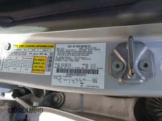 2019 Ford Fusion SE with VIN 3FA6P0LU1KR222141, listed as a IAAI auction lot 42000677 with 122,898 mi miles and . Bid and sale history available at carsss.com. Image 9.