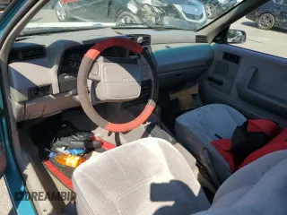 1992 Plymouth Sundance z VIN 1P3XP24D7NN120553, wystawiony jako Copart lot #68472794 z przebiegiem 148 535 mil mil oraz Szkody całkowita. Historia ofert i sprzedaży dostępna na DreamBid. Obrazek 8.