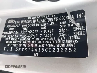 2012 Kia Sorento LX z VIN 5XYKT4A15CG232252, wystawiony jako IAAI lot #42168437 z przebiegiem 118 540 mil mil oraz . Historia ofert i sprzedaży dostępna na DreamBid. Obrazek 9.