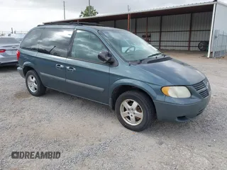 2005 Dodge Caravan SXT with VIN 1D4GP45R15B230816, listed as a IAAI auction lot 41827129 with 143,116 mi miles. Bid and sale history available at carsss.com. Image 1.