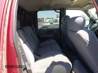 2003 Ford F-150 XLT with VIN 1FTRW08L63KA20475, listed as a IAAI auction lot 42610305 with Not provided miles and . Bid and sale history available at DreamBid. Image 8.
