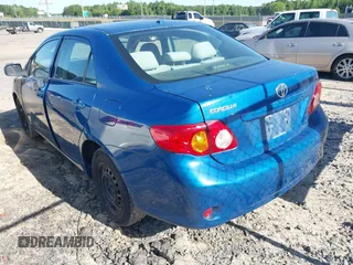 2009 Toyota Corolla with VIN 2T1BU40E69C166333, listed as a IAAI auction lot 42137539 with 127,564 mi miles. Bid and sale history available at carsss.com. Image 3.