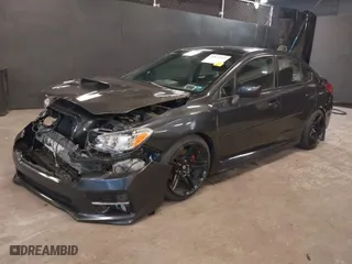 2015 Subaru WRX Premium with VIN JF1VA1D61F9828771, listed as a IAAI auction lot 41877127 with NaN miles. Bid and sale history available at carsss.com. Image 2.