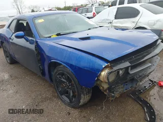 2012 Dodge Challenger SXT Plus with VIN 2C3CDYAG1CH293164, listed as a IAAI auction lot 41936125 with 205,787 mi miles. Bid and sale history available at carsss.com. Image 1.