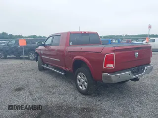 2014 Ram 2500 Laramie with VIN 3C6UR5NJ1EG276591, listed as a IAAI auction lot 42517879 with 145,466 mi miles and . Bid and sale history available at DreamBid. Image 3.