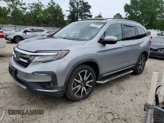 2019 Honda Pilot Touring 8-Passenger z VIN 5FNYF6H9XKB059410, wystawiony jako Copart lot #57126695 z przebiegiem 81 803 mil mil oraz Szkoda całkowita • Salvage title. Historia ofert i sprzedaży dostępna na DreamBid. Obrazek 1.