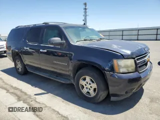 2007 Chevrolet Suburban LS z VIN 1GNFC160X7J180517, wystawiony jako Copart lot #63933475 z przebiegiem Nie podano mil oraz Czysty tytuł • Clean title. Historia ofert i sprzedaży dostępna na DreamBid. Obrazek 4.