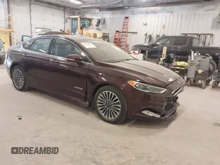 2018 Ford Fusion Titanium with VIN 3FA6P0RU9JR215430, listed as a IAAI auction lot 42135534 with 77,521 mi miles and . Bid and sale history available at DreamBid. Image 1.