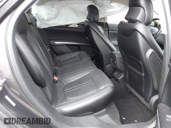 2015 Lincoln MKZ with VIN 3LN6L2J97FR616714, listed as a IAAI auction lot 41664184 with 116,495 mi miles and . Bid and sale history available at DreamBid. Image 8.